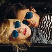 Male and Female Models wearing Carrera 1B