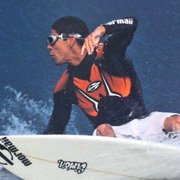 Pro Surfer wearing Mormaii Floater 251